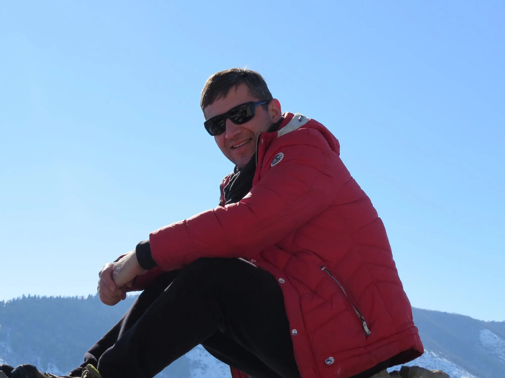 Davit sitting on mountaintop